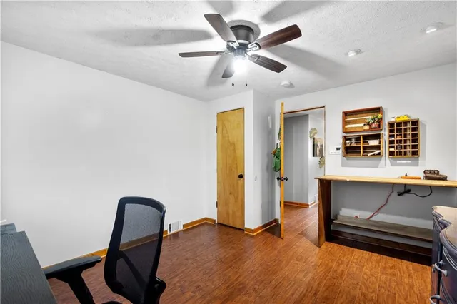 a bedroom with furniture and window