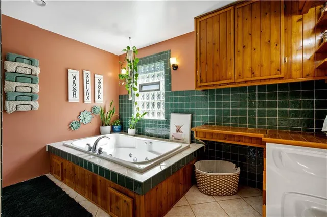 a bathroom with a sink and a bathtub