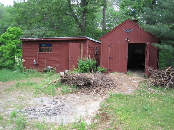 115 Baker Pond Road Dudley, MA 01571 - Photo 4 of 17 a front view of a house with garden