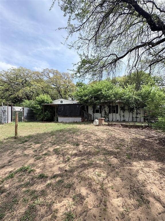 6295 Rendon New Hope Road Fort Worth, TX 76140 - Photo 27 of 38 Single-story residence featuring a covered front porch and a white exterior