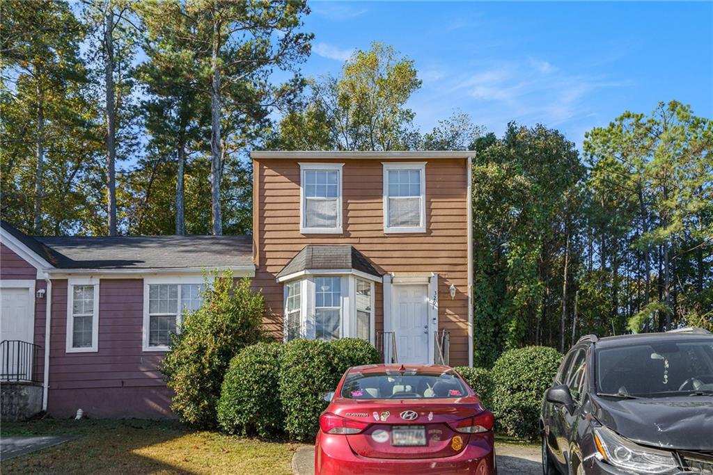 3201 Kingswood Place Decatur, GA 30034 - Photo 1 of 22 a front view of a house with a yard
