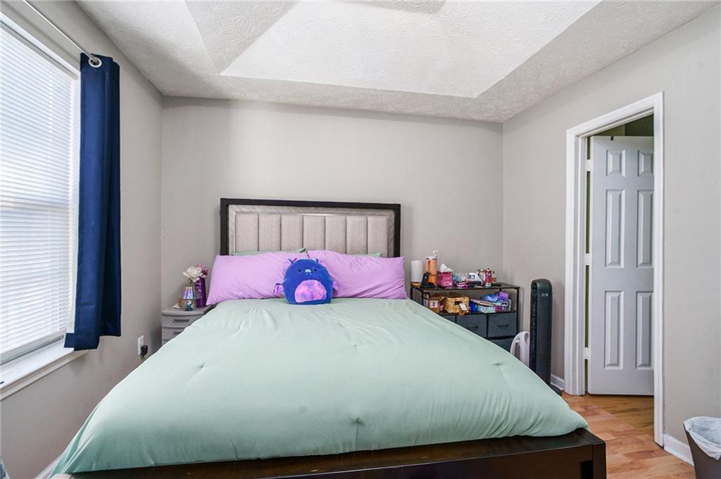 3201 Kingswood Place Decatur, GA 30034 - Photo 11 of 22 a bedroom with a bed and window