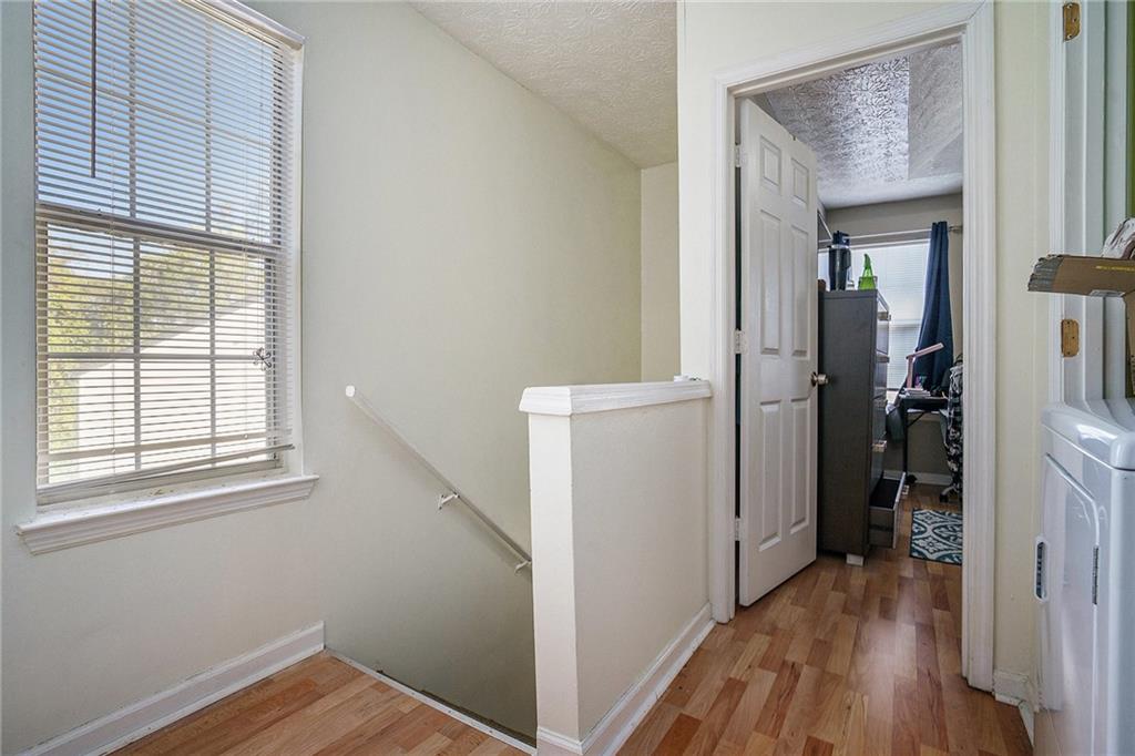3201 Kingswood Place Decatur, GA 30034 - Photo 13 of 22 a view of hallway with bathroom and wooden floor