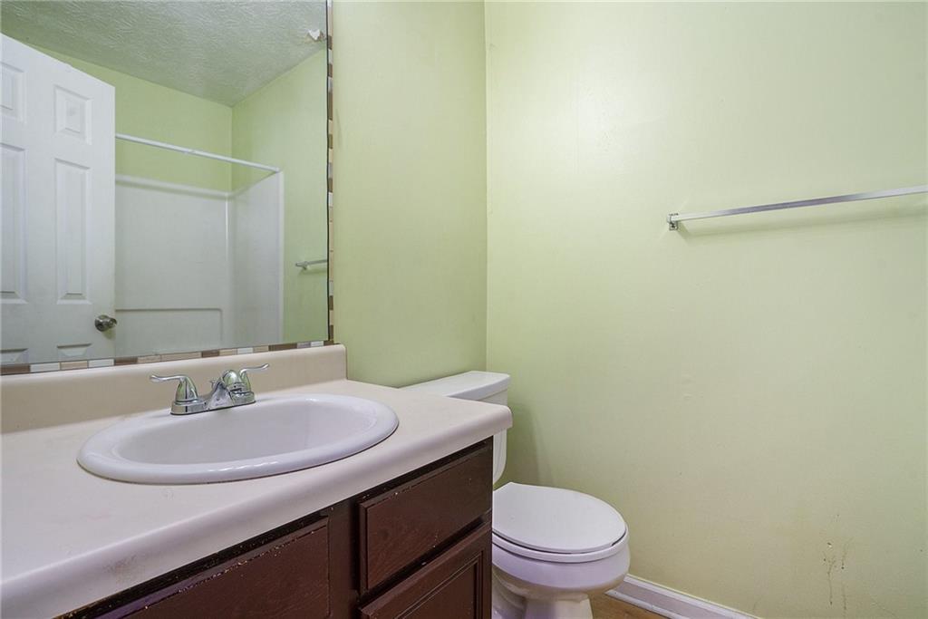 3201 Kingswood Place Decatur, GA 30034 - Photo 17 of 22 a bathroom with a sink toilet and a mirror