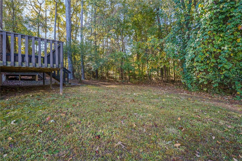 3201 Kingswood Place Decatur, GA 30034 - Photo 22 of 22 a view of backyard with deck and outdoor seating