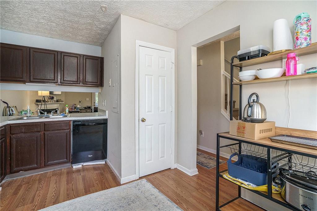 3201 Kingswood Place Decatur, GA 30034 - Photo 8 of 22 a kitchen with stainless steel appliances granite countertop a refrigerator and a stove top oven