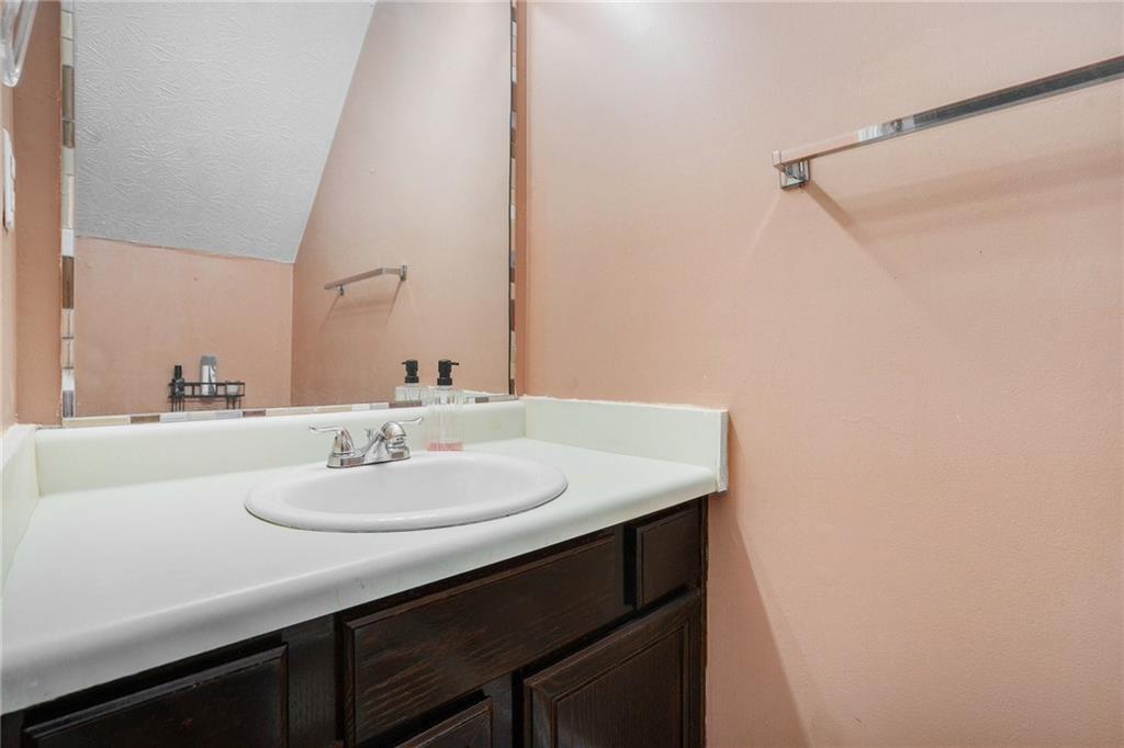 3201 Kingswood Place Decatur, GA 30034 - Photo 9 of 22 a bathroom with a sink and a mirror