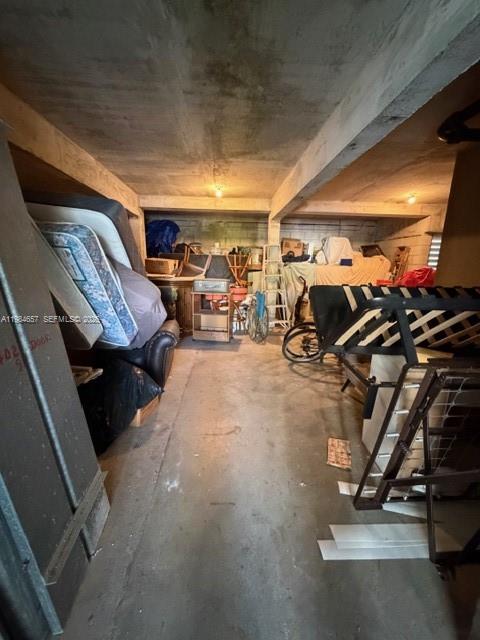 9159 Southwest 77th Avenue, Unit 409 Miami, FL 33156 - Photo 23 of 29 a view of a room with gym equipment