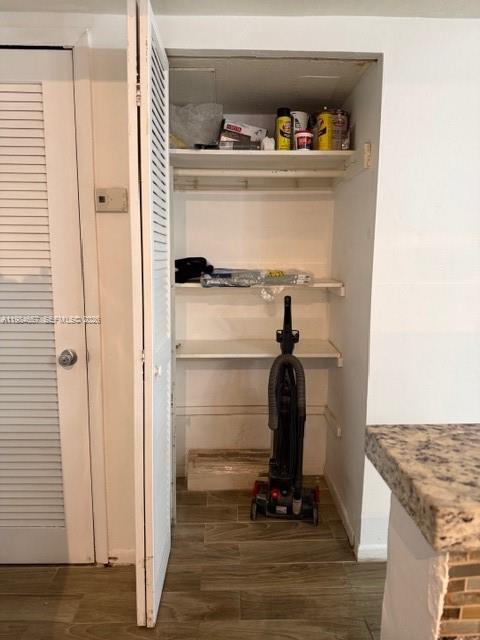 9159 Southwest 77th Avenue, Unit 409 Miami, FL 33156 - Photo 8 of 29 a room with storage and utility