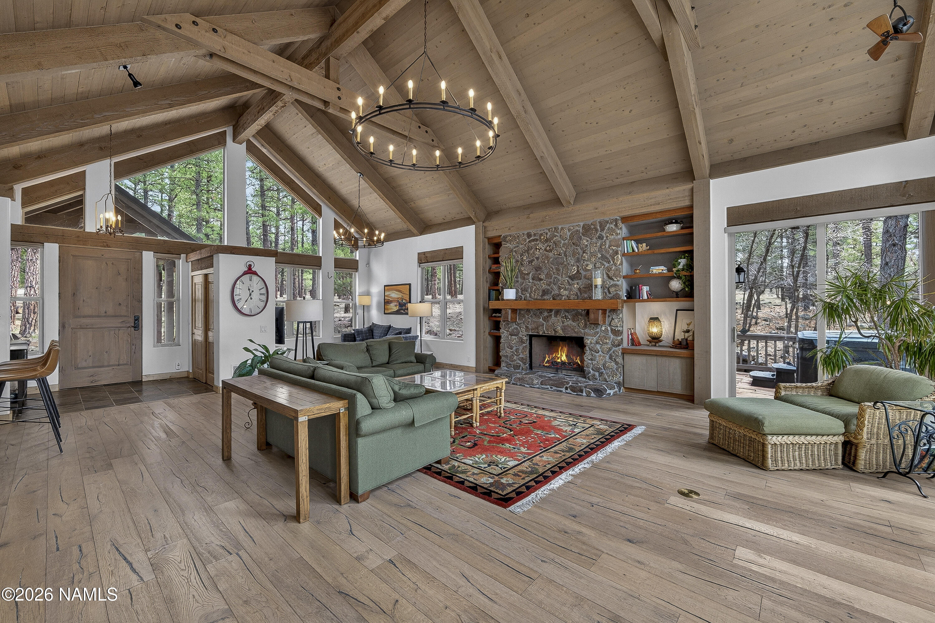 105 West Mt Elden Lookout Road Flagstaff, AZ 86001 - Photo 17 of 54 a living room with furniture large window and wooden floor