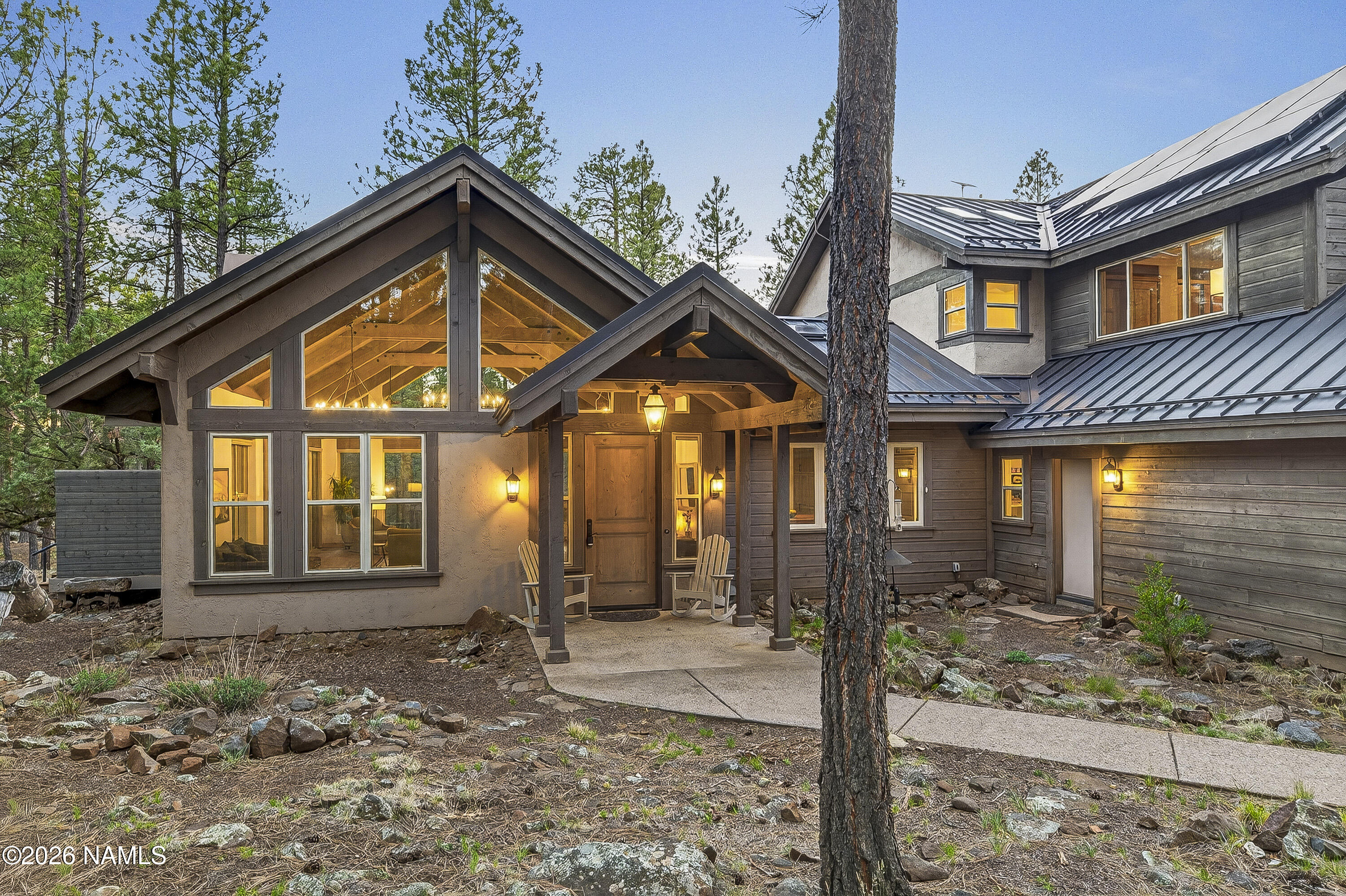 105 West Mt Elden Lookout Road Flagstaff, AZ 86001 - Photo 2 of 54 a front view of a house with garden