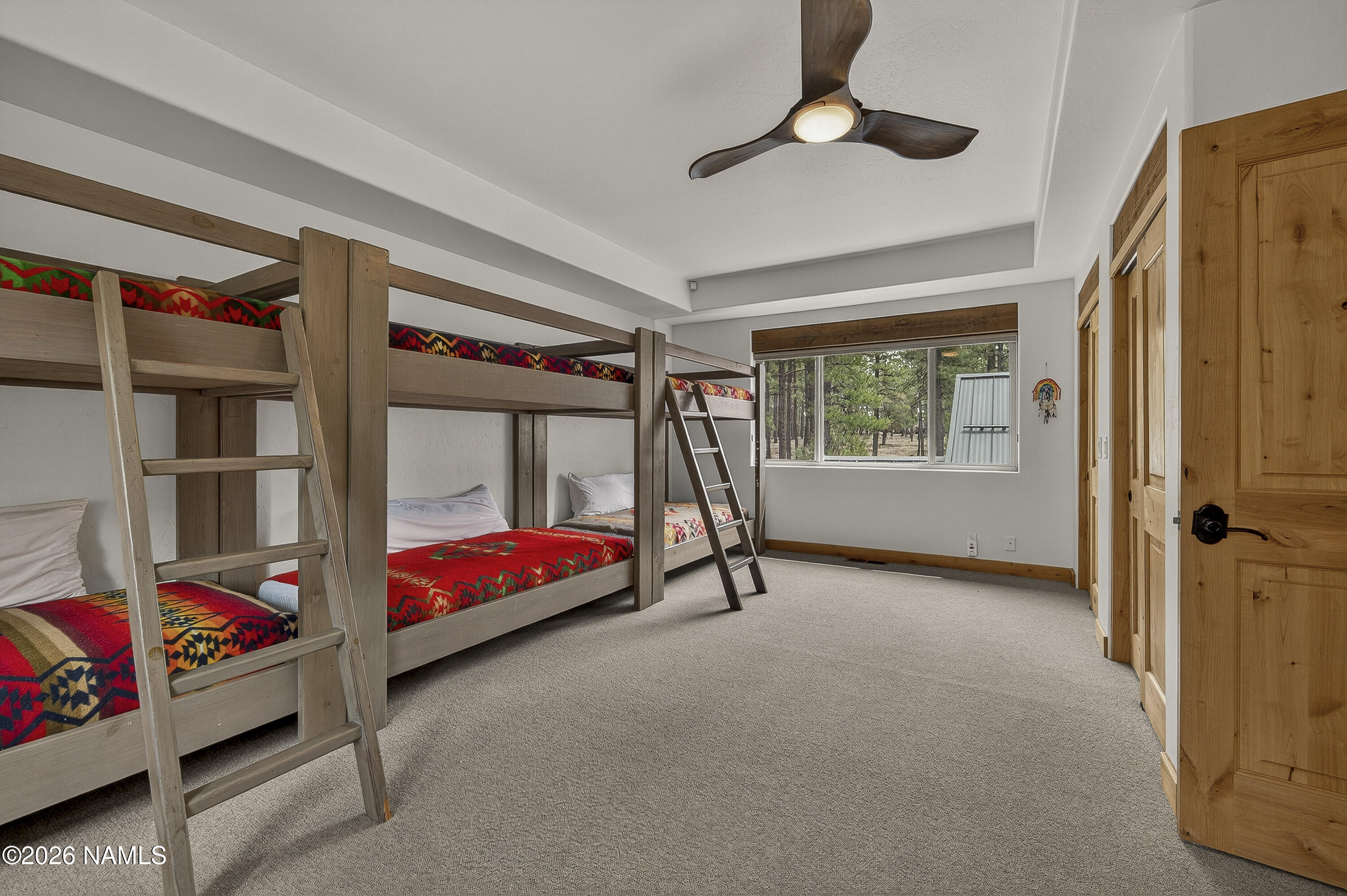 105 West Mt Elden Lookout Road Flagstaff, AZ 86001 - Photo 39 of 54 a bedroom with bed and a window