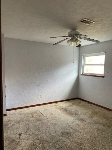 47 Devonshire Drive Conroe, TX 77304 - Photo 19 of 27 an empty room with windows