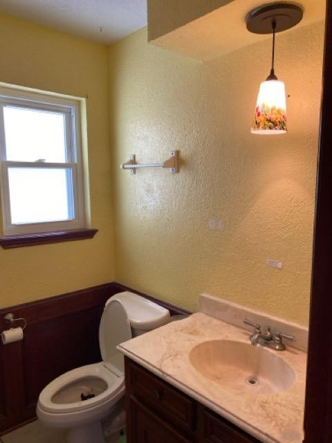 47 Devonshire Drive Conroe, TX 77304 - Photo 24 of 27 a bathroom with a sink a toilet and a window