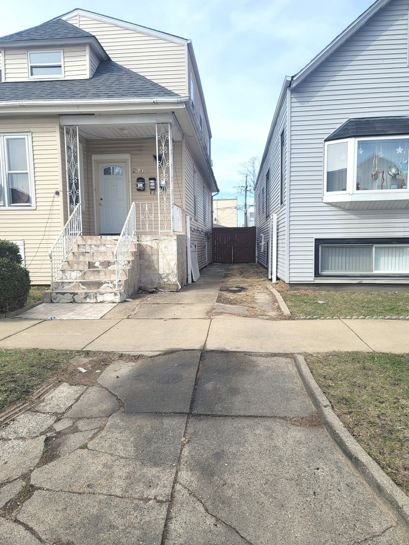 2240 North Monitor Avenue Chicago, IL 60639 - Photo 2 of 8 a view of a house with a outdoor space