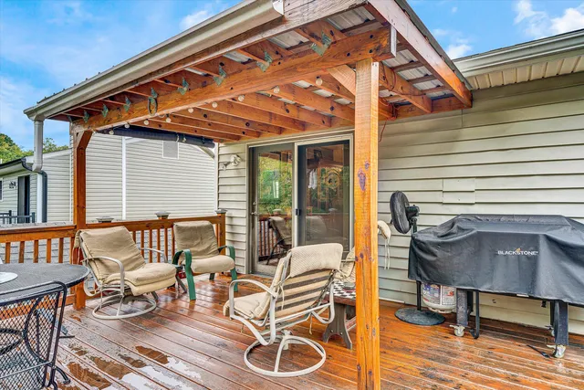 a patio with table and chairs