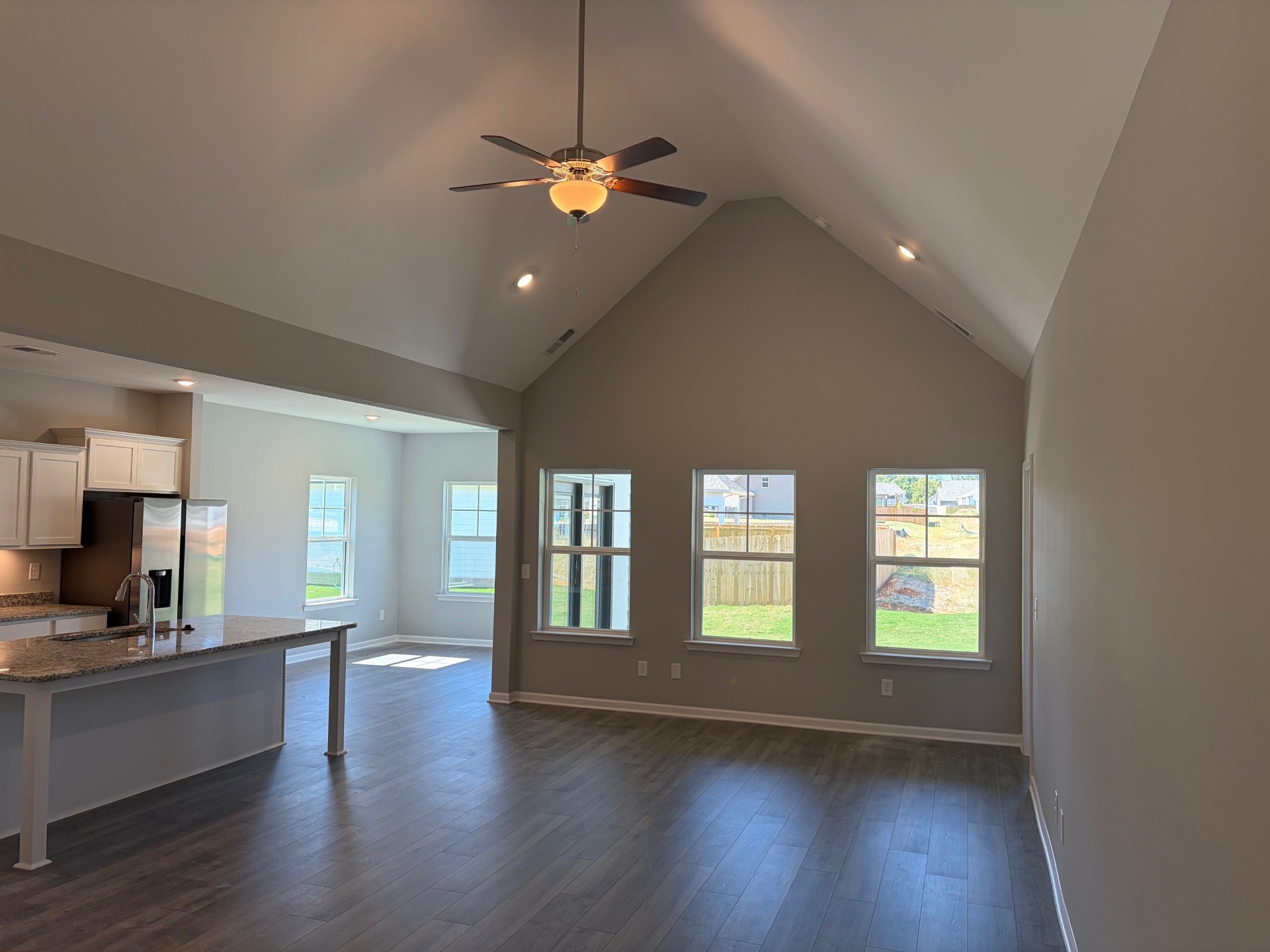 1006 Wiseman Farm Road Fairview, TN 37062 - Photo 2 of 9 wooden floor in an empty room with a window