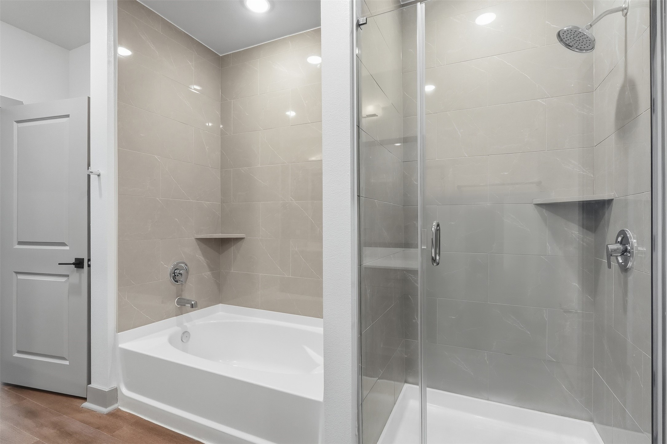 1950 Winrock Boulevard, Unit B2 Houston, TX 77057 - Photo 12 of 32 a bathroom with a bathtub and shower