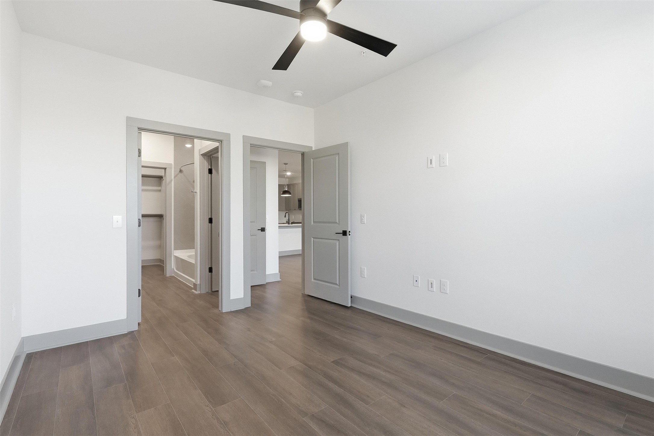 1950 Winrock Boulevard, Unit B2 Houston, TX 77057 - Photo 18 of 32 wooden floor in an empty room