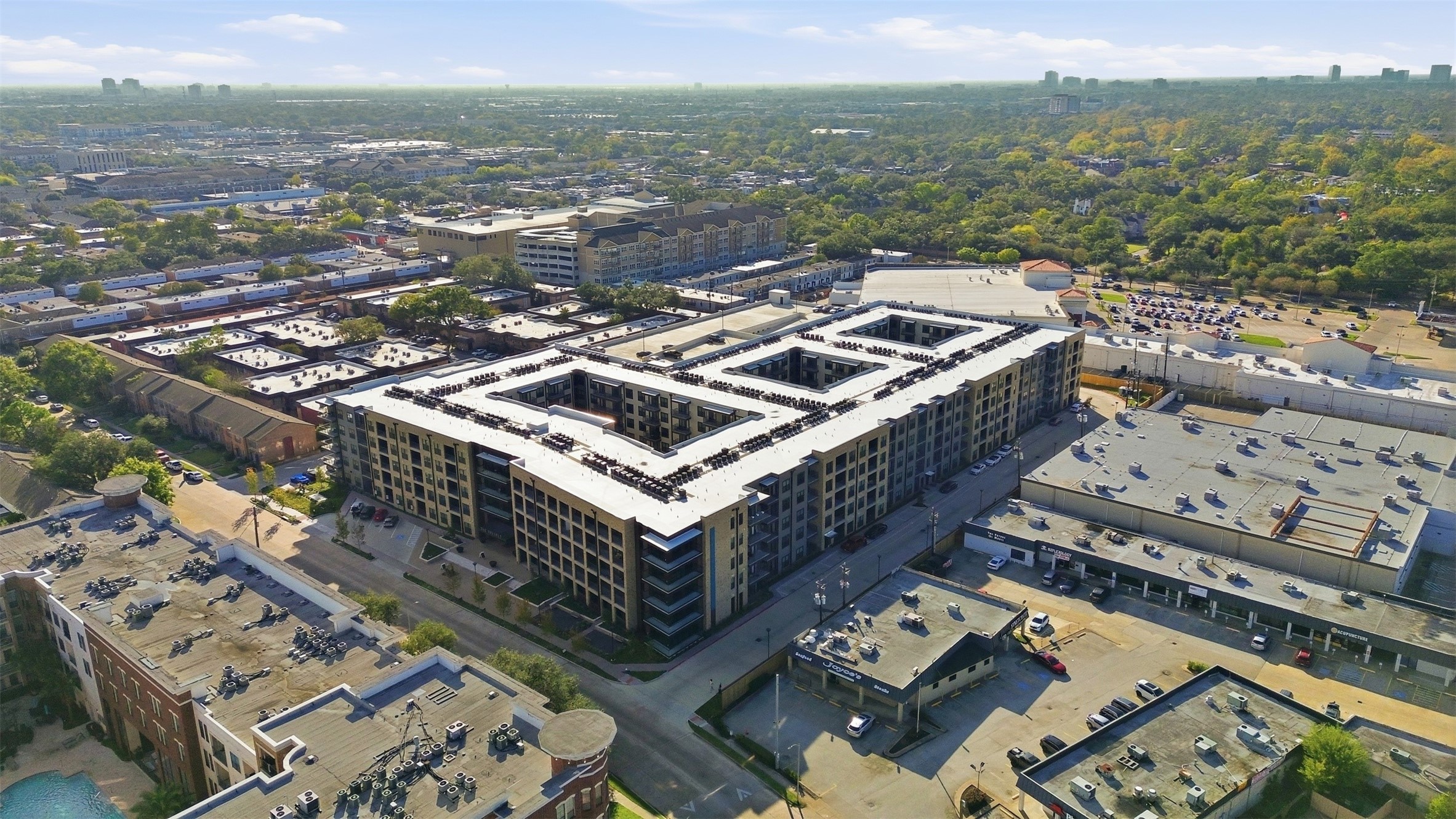 1950 Winrock Boulevard, Unit B2 Houston, TX 77057 - Photo 23 of 32 a city view with tall buildings