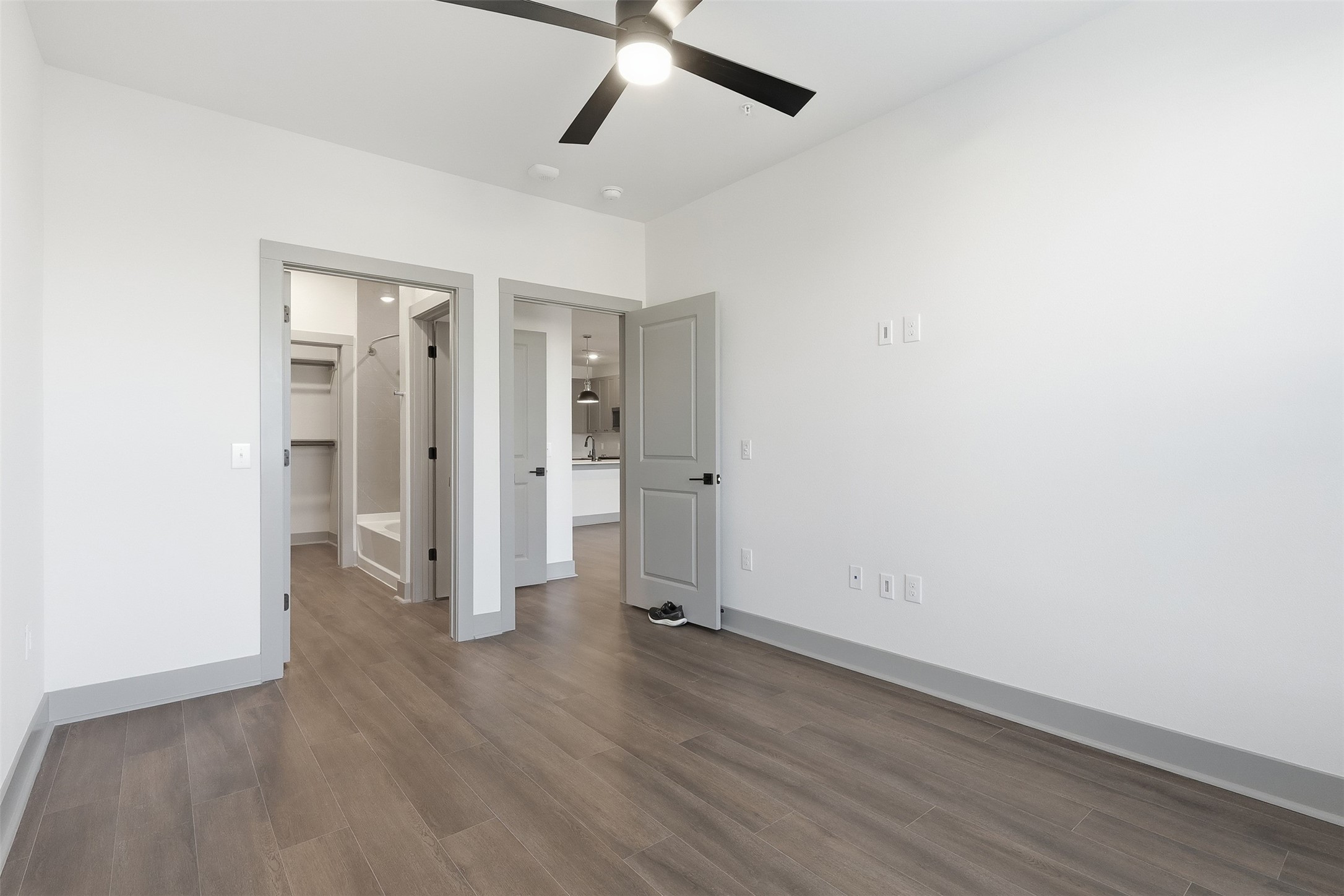 1950 Winrock Boulevard, Unit B2 Houston, TX 77057 - Photo 9 of 32 wooden floor in an empty room