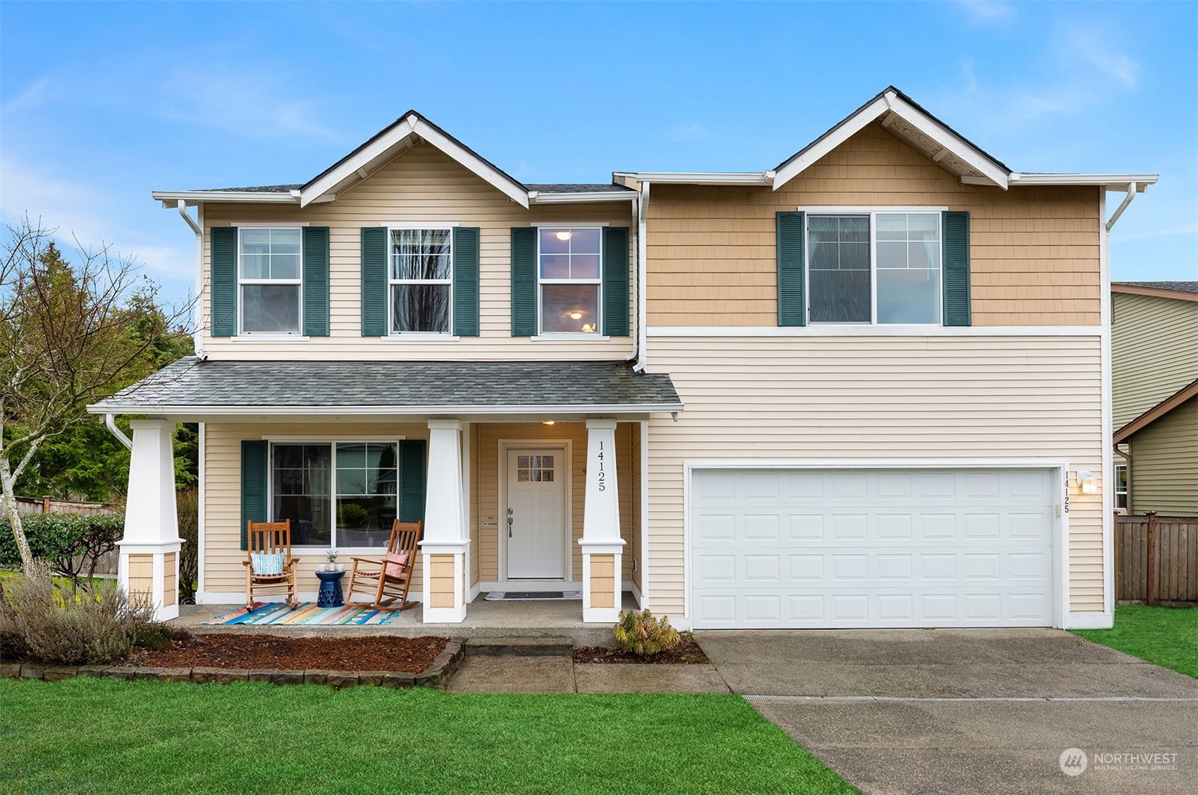 14125 Corbridge Road Southeast Monroe, WA 98272 - Photo 1 of 34 a front view of a house with a yard and garage