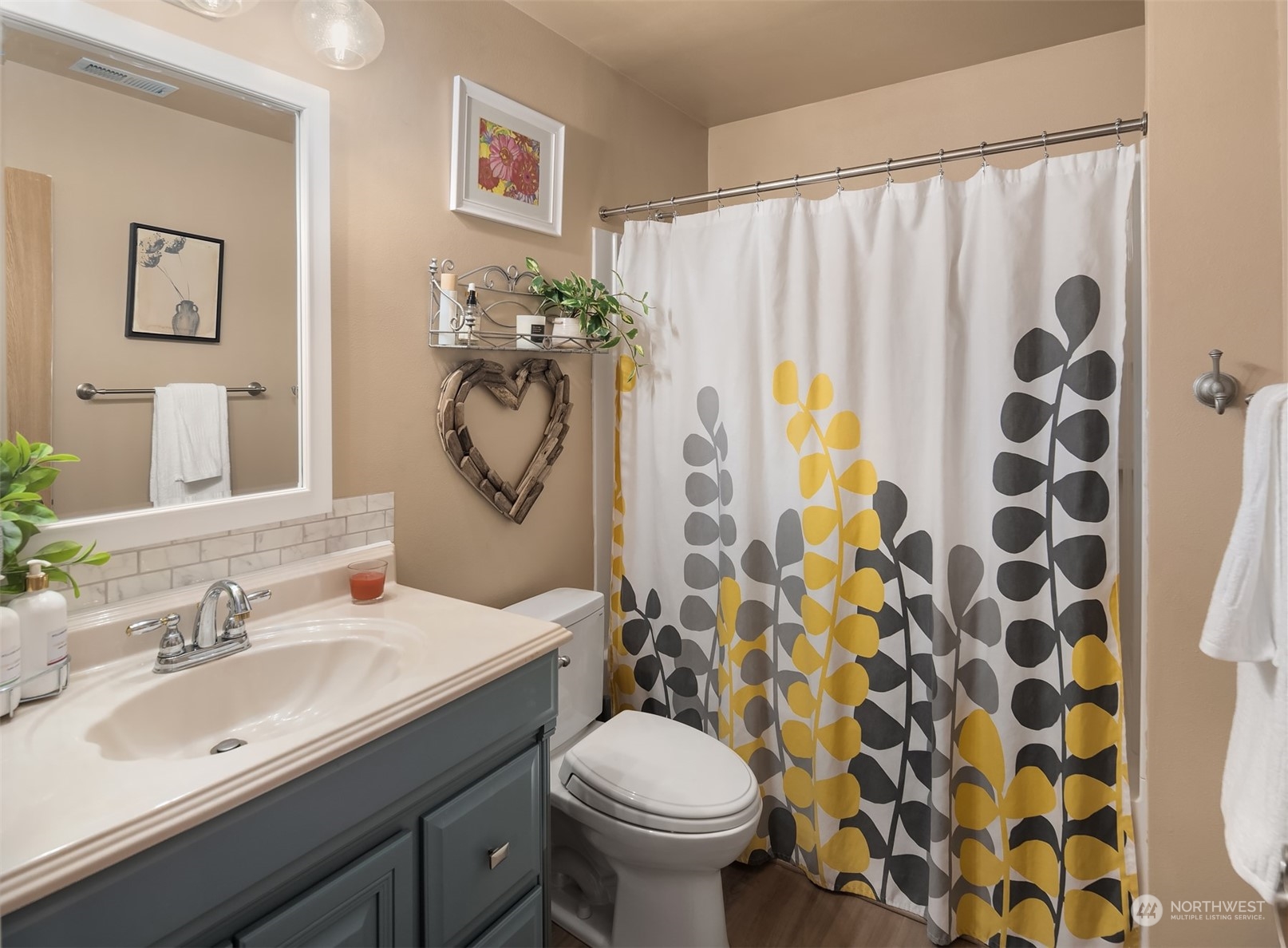 14125 Corbridge Road Southeast Monroe, WA 98272 - Photo 13 of 34 a bathroom with a sink toilet and shower