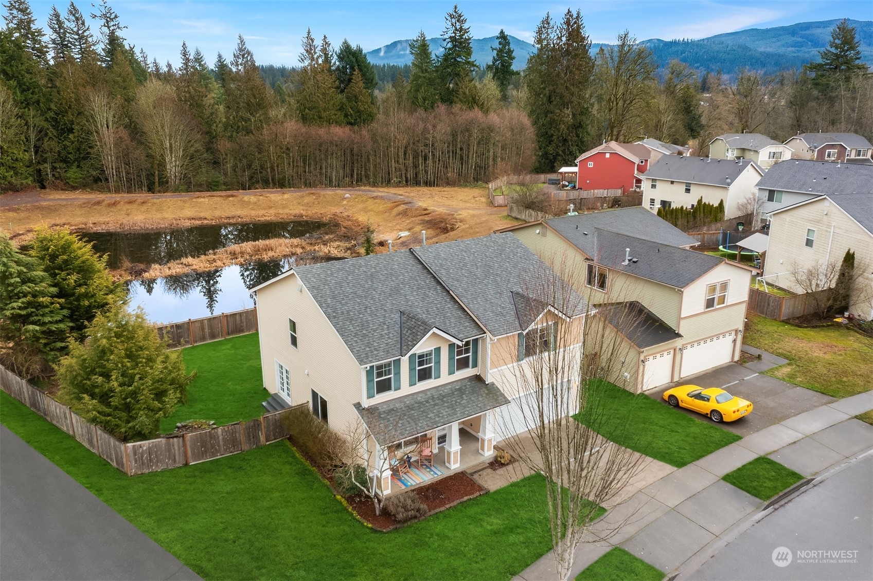 14125 Corbridge Road Southeast Monroe, WA 98272 - Photo 2 of 34 an aerial view of a house with swimming pool