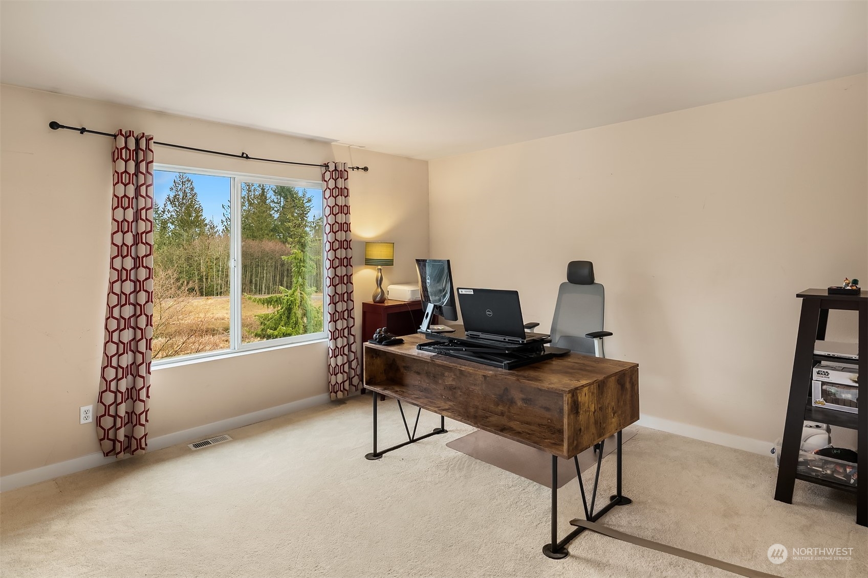 14125 Corbridge Road Southeast Monroe, WA 98272 - Photo 21 of 34 a view of a workspace with furniture and a window