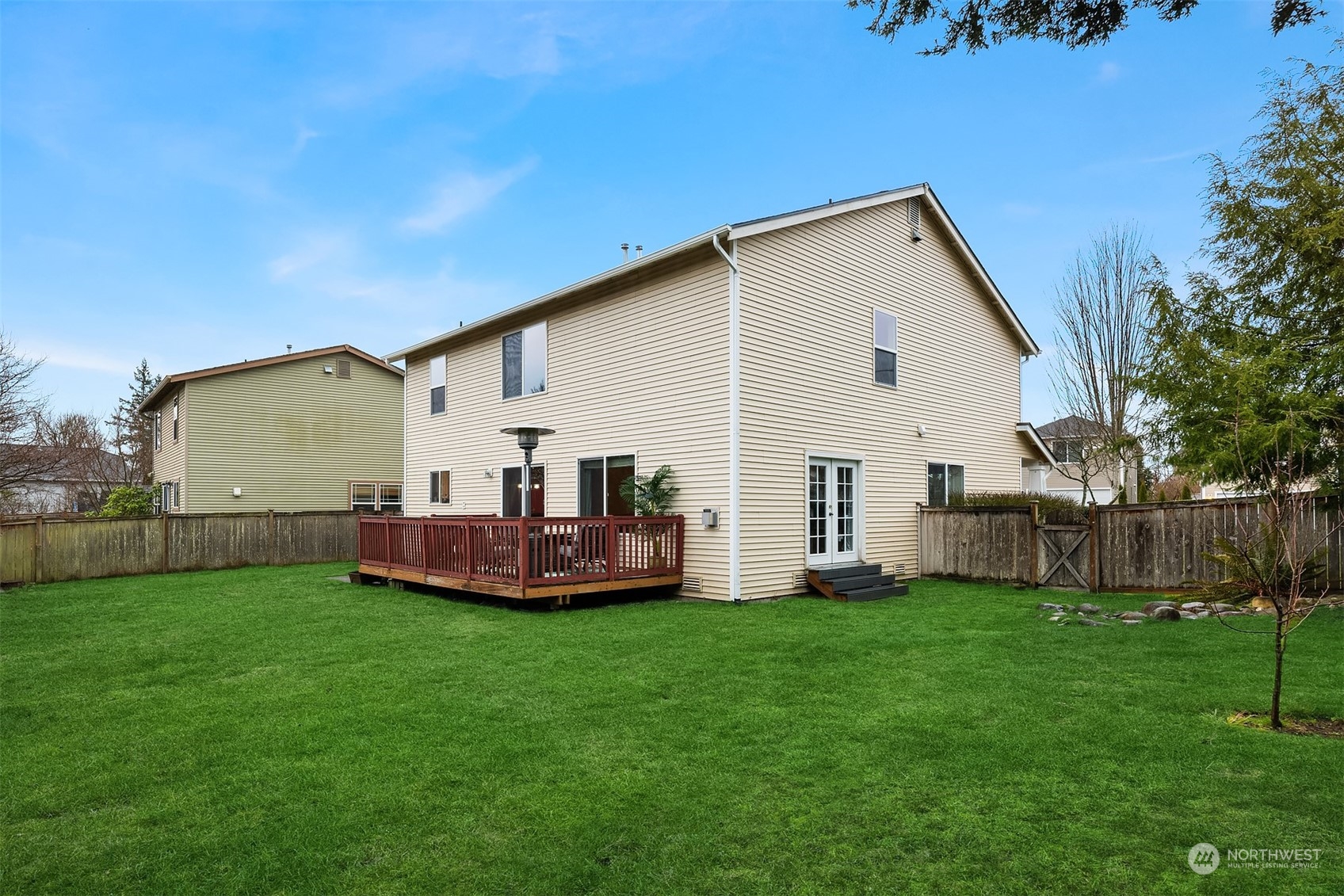 14125 Corbridge Road Southeast Monroe, WA 98272 - Photo 28 of 34 a view of a house with backyard and porch