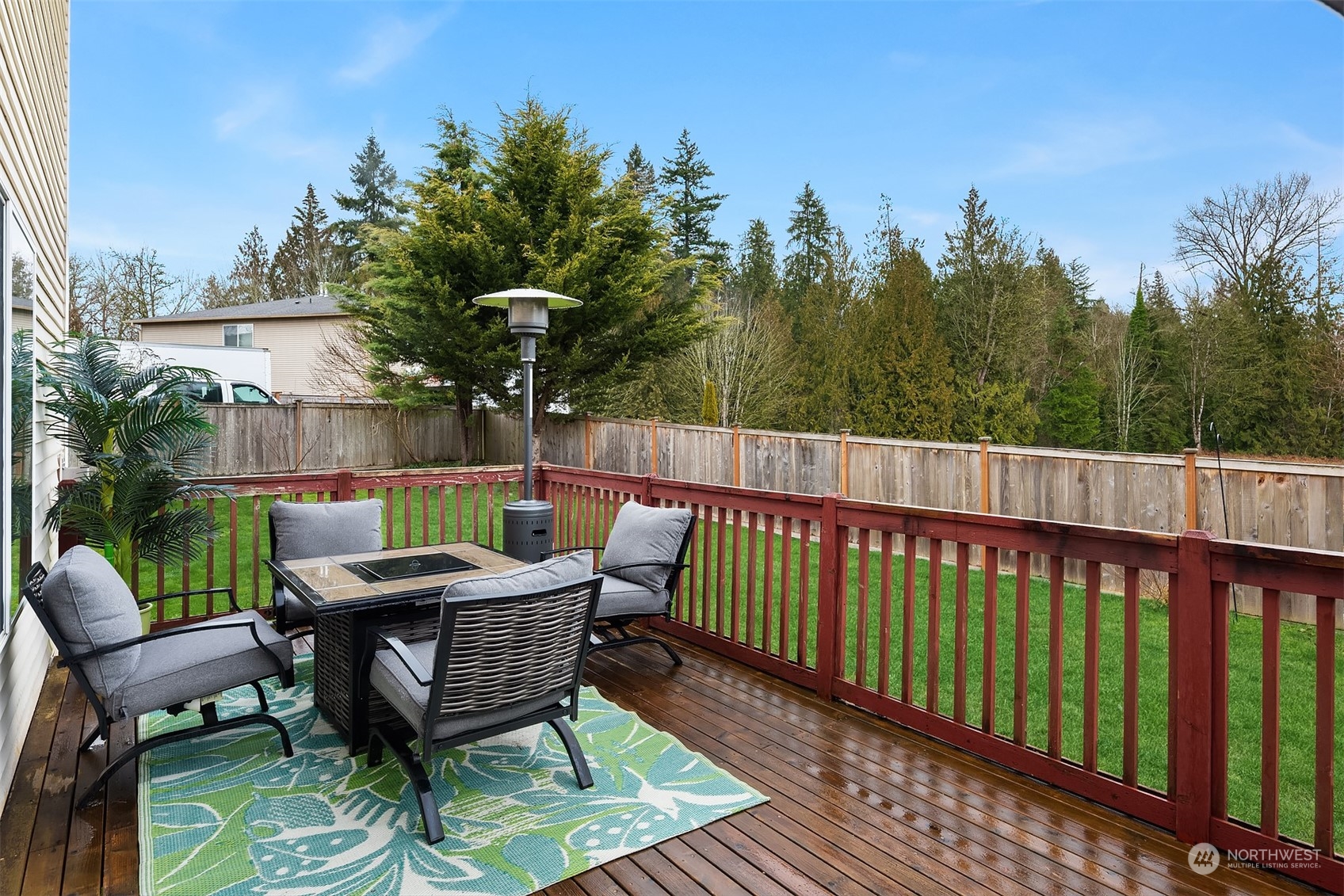 14125 Corbridge Road Southeast Monroe, WA 98272 - Photo 31 of 34 a view of a wooden bench on the roof deck