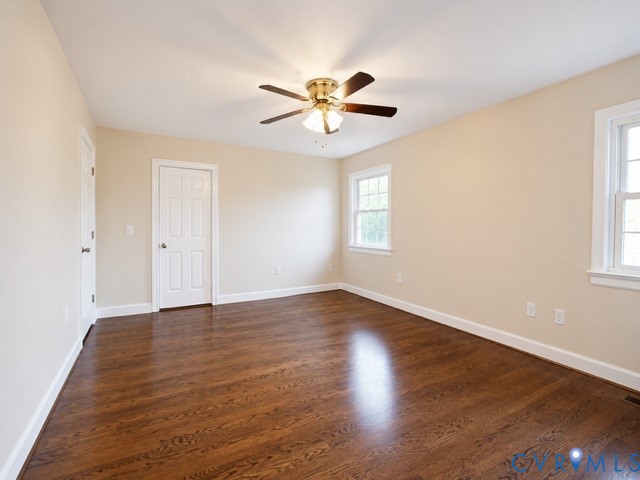 16487 Mountain Road Montpelier, VA 23192 - Photo 10 of 16 a view of an empty room with window and wooden floor