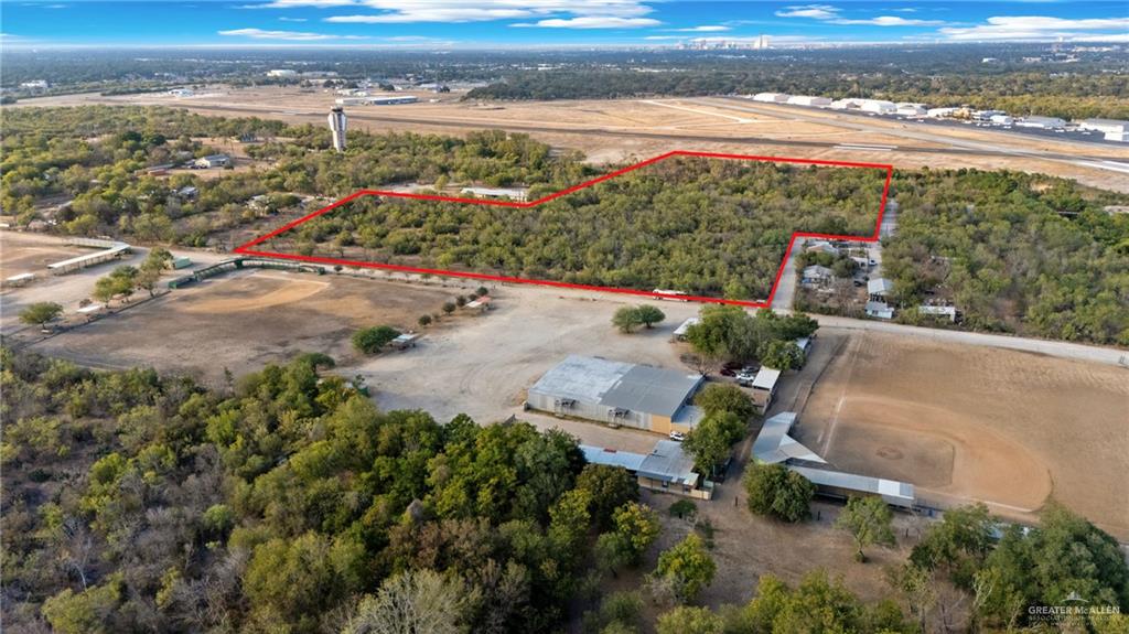 1706 East Ashley Road San Antonio, TX 78214 - Photo 4 of 16 Expansive wooded acreage outlined in red, featuring mature trees and clearings