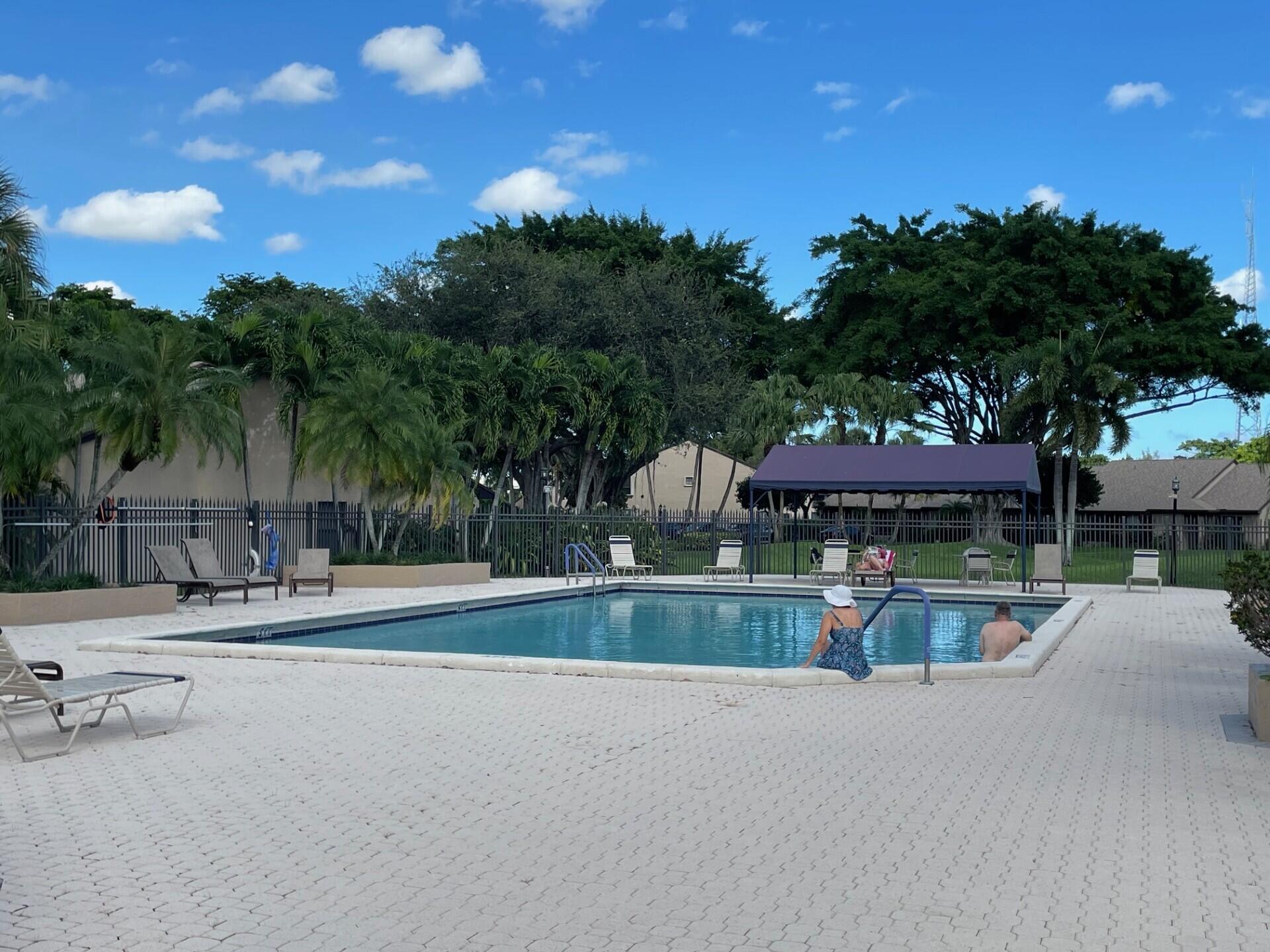 8471 Boca Glades Boulevard East Boca Raton, FL 33434 - Photo 20 of 29 a house with a garden space