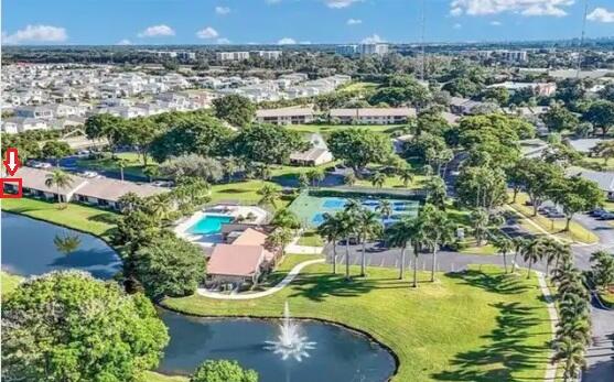 8471 Boca Glades Boulevard East Boca Raton, FL 33434 - Photo 27 of 29 an aerial view of residential houses with outdoor space and swimming pool