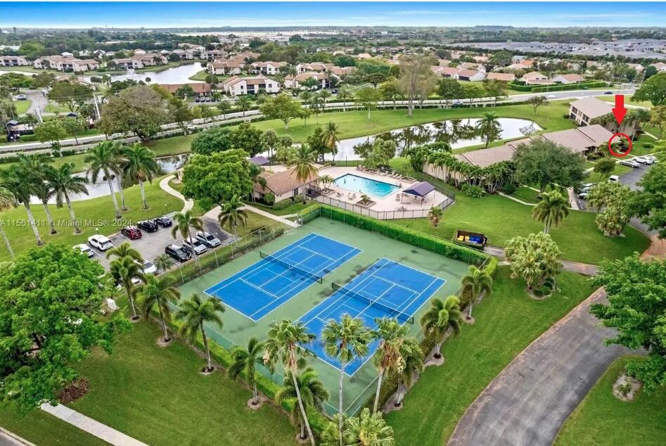 8471 Boca Glades Boulevard East Boca Raton, FL 33434 - Photo 28 of 29 an aerial view of a golf course with parking space