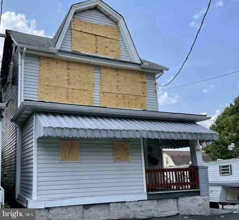 a view of entrance gate of the house