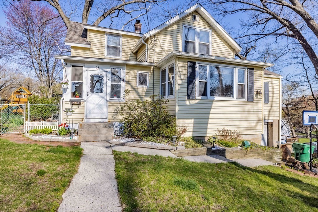 90 Rochester Street Chicopee, MA 01020 - Photo 1 of 31 front view of a house with a yard