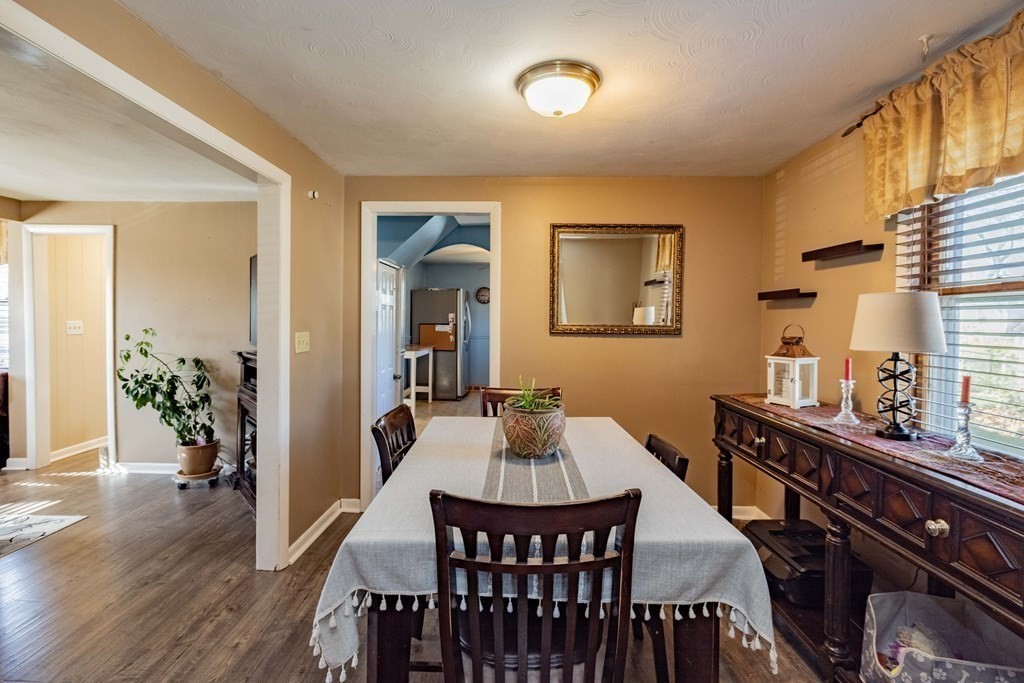 90 Rochester Street Chicopee, MA 01020 - Photo 12 of 31 a view of a dining room with furniture and wooden floor