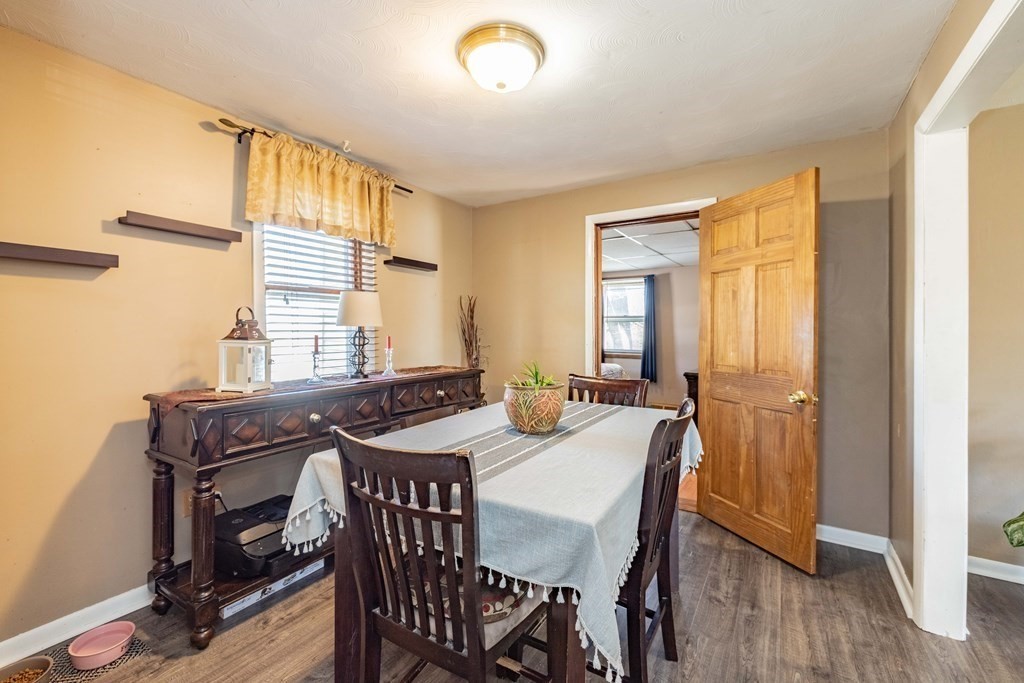90 Rochester Street Chicopee, MA 01020 - Photo 13 of 31 a view of a dining room with furniture and window
