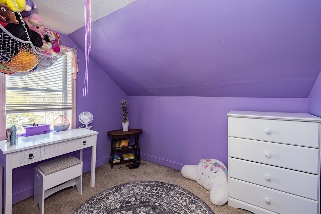 90 Rochester Street Chicopee, MA 01020 - Photo 21 of 31 a bedroom with a bed and a window