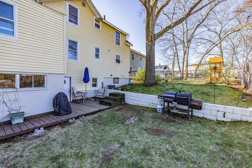 90 Rochester Street Chicopee, MA 01020 - Photo 27 of 31 a view of a house with backyard and sitting area