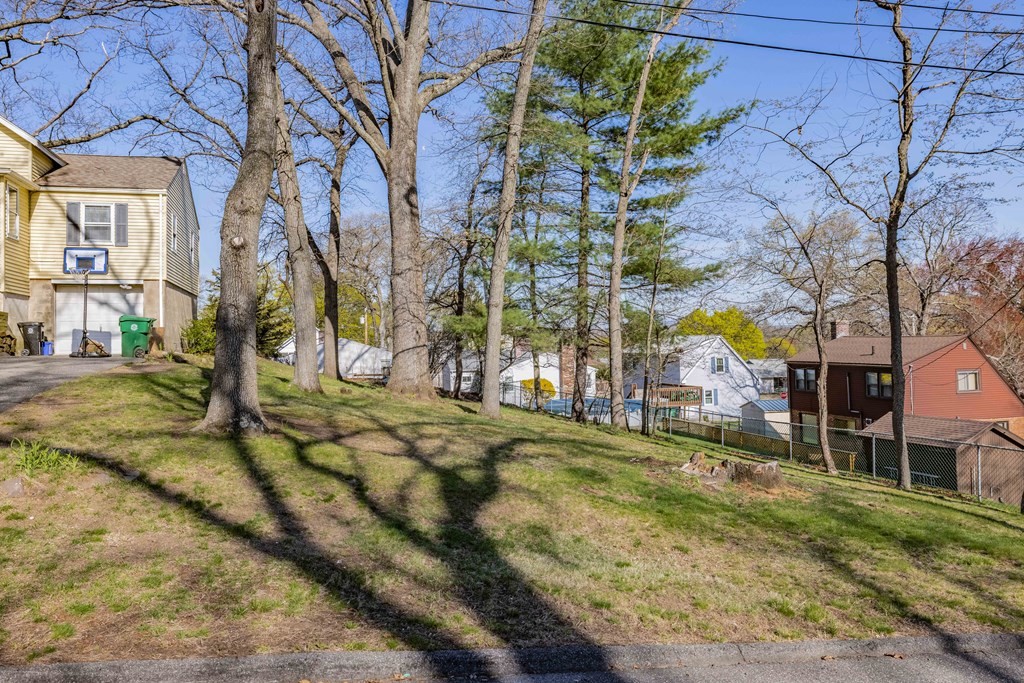 90 Rochester Street Chicopee, MA 01020 - Photo 30 of 31 a view of a street with houses on both side