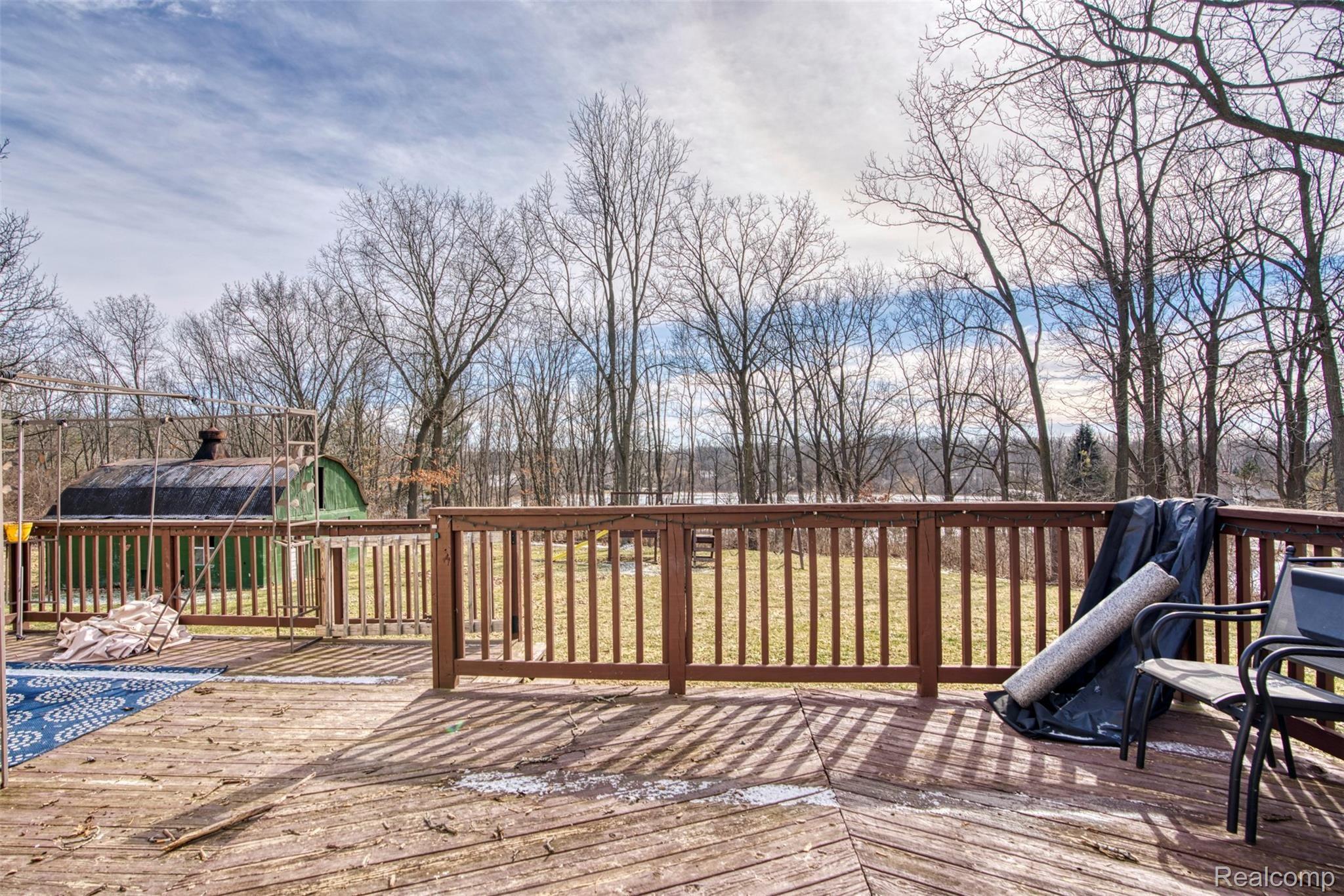 2150 East Coon Lake Road Howell, MI 48843 - Photo 24 of 36 2150 Coon Lake deck 2.jpg