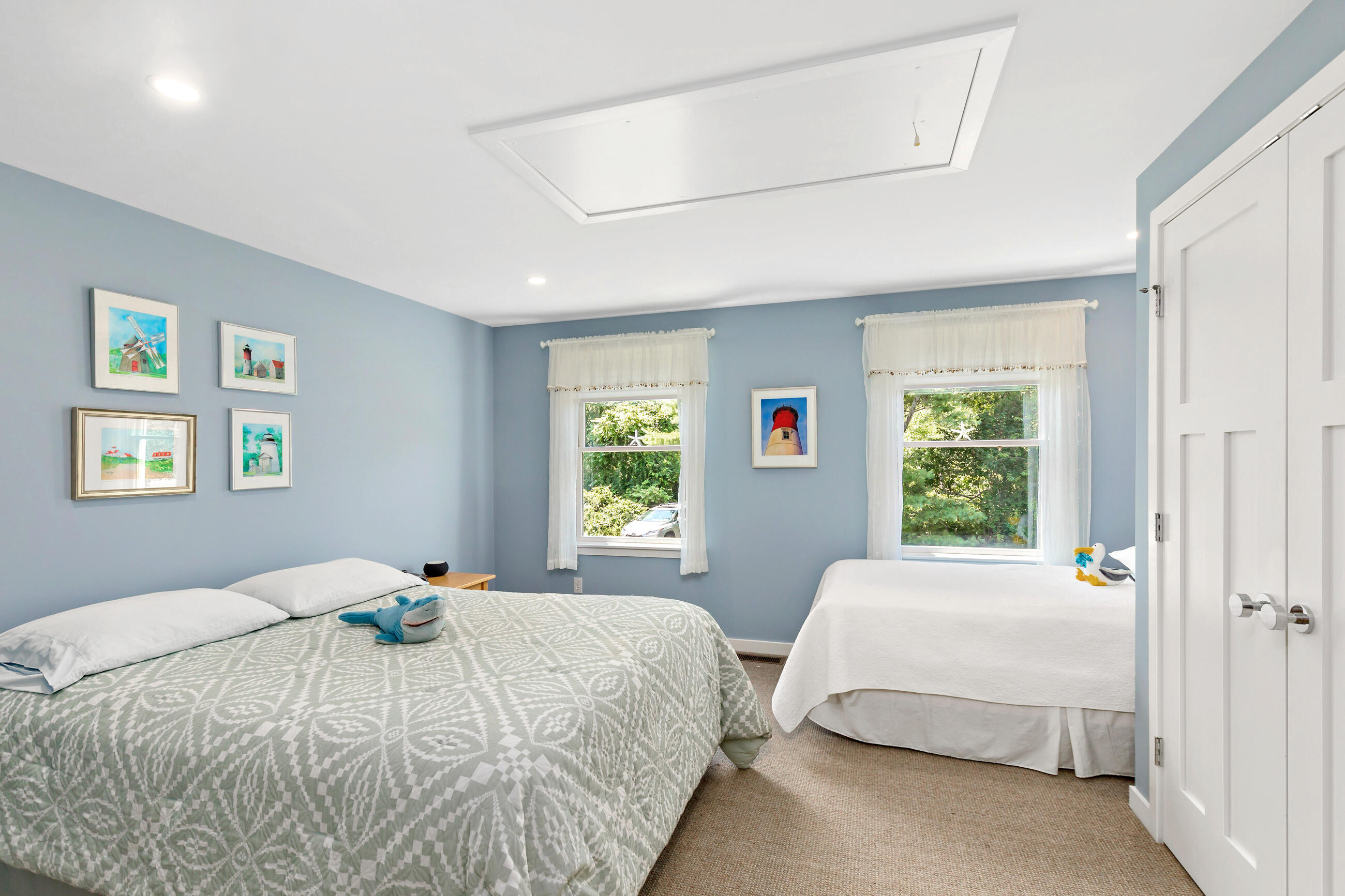 625 Samoset Road Eastham, MA 02642 - Photo 52 of 77 a bedroom with a bed and a window