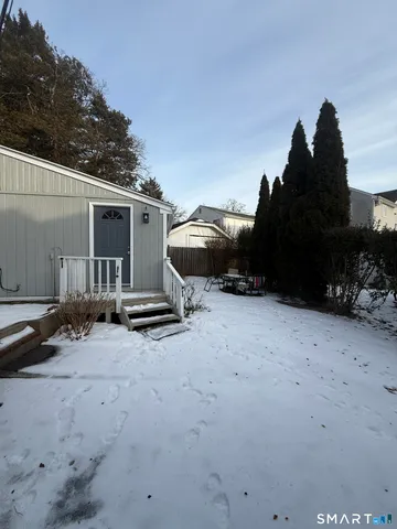a view of a backyard of a house