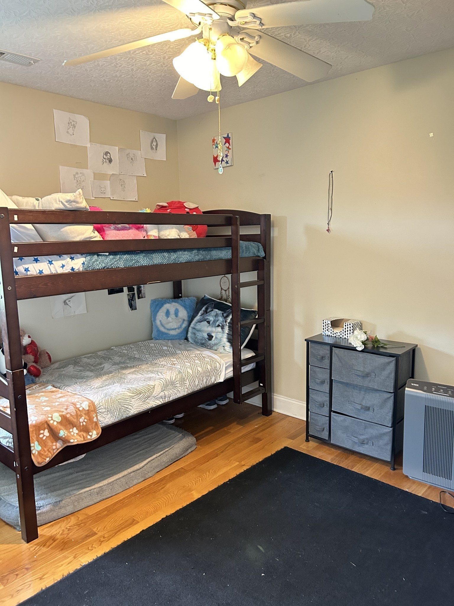 3421 George Olive Road Iron City, TN 38463 - Photo 34 of 51 a bedroom with a bed and chandelier