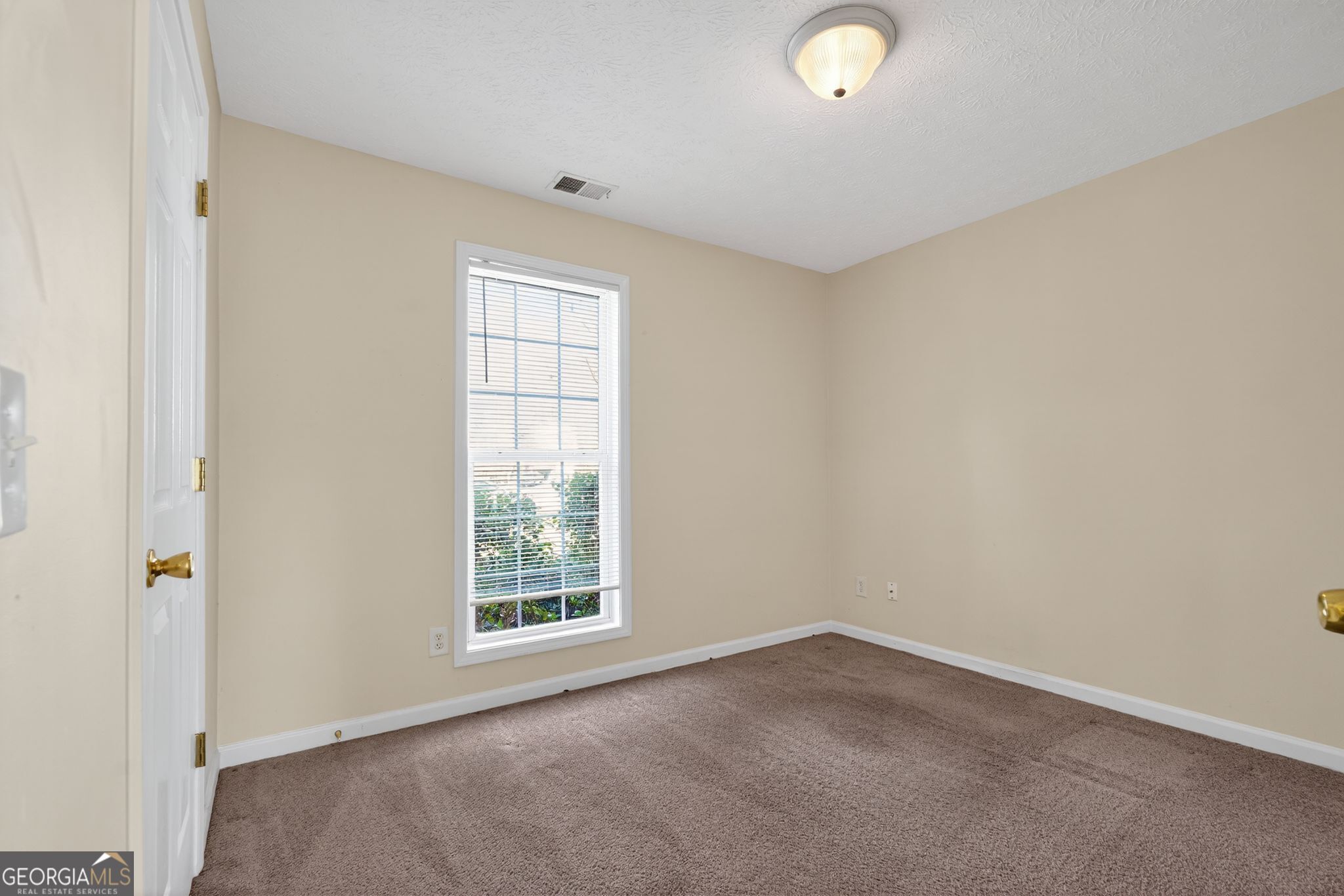 3255 River Run Trail Decatur, GA 30034 - Photo 11 of 37 an empty room with windows and closet