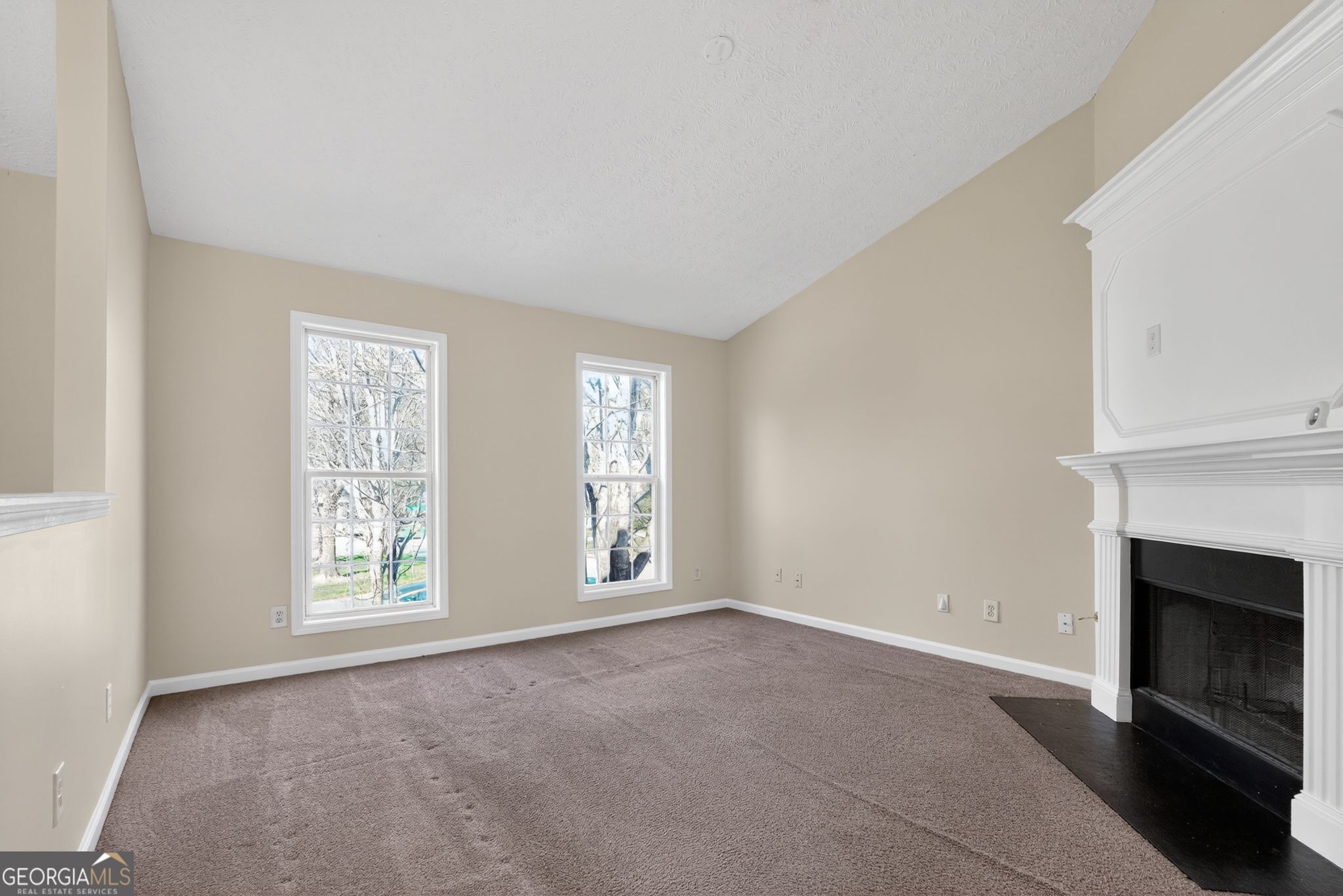 3255 River Run Trail Decatur, GA 30034 - Photo 12 of 37 a view of an empty room with a window and fireplace