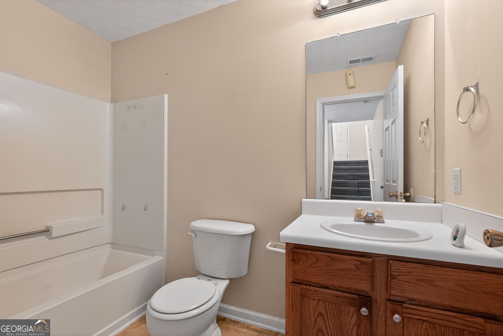 3255 River Run Trail Decatur, GA 30034 - Photo 29 of 37 a bathroom with a sink toilet a mirror and shower